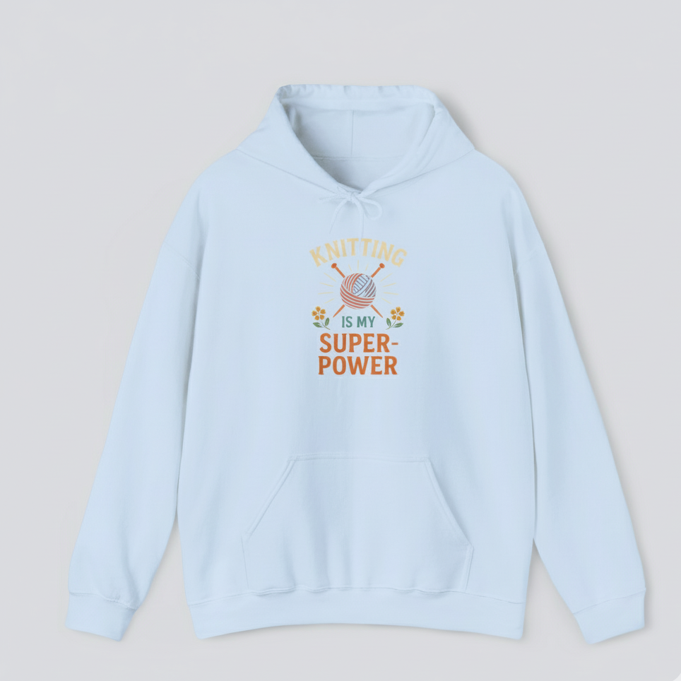 Light blue hoodie with 'Knitting is my superpower' text on a light gray background