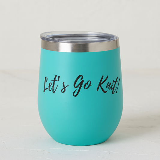 Turquoise tumbler with 'Let's Go Knit!' text on a white background