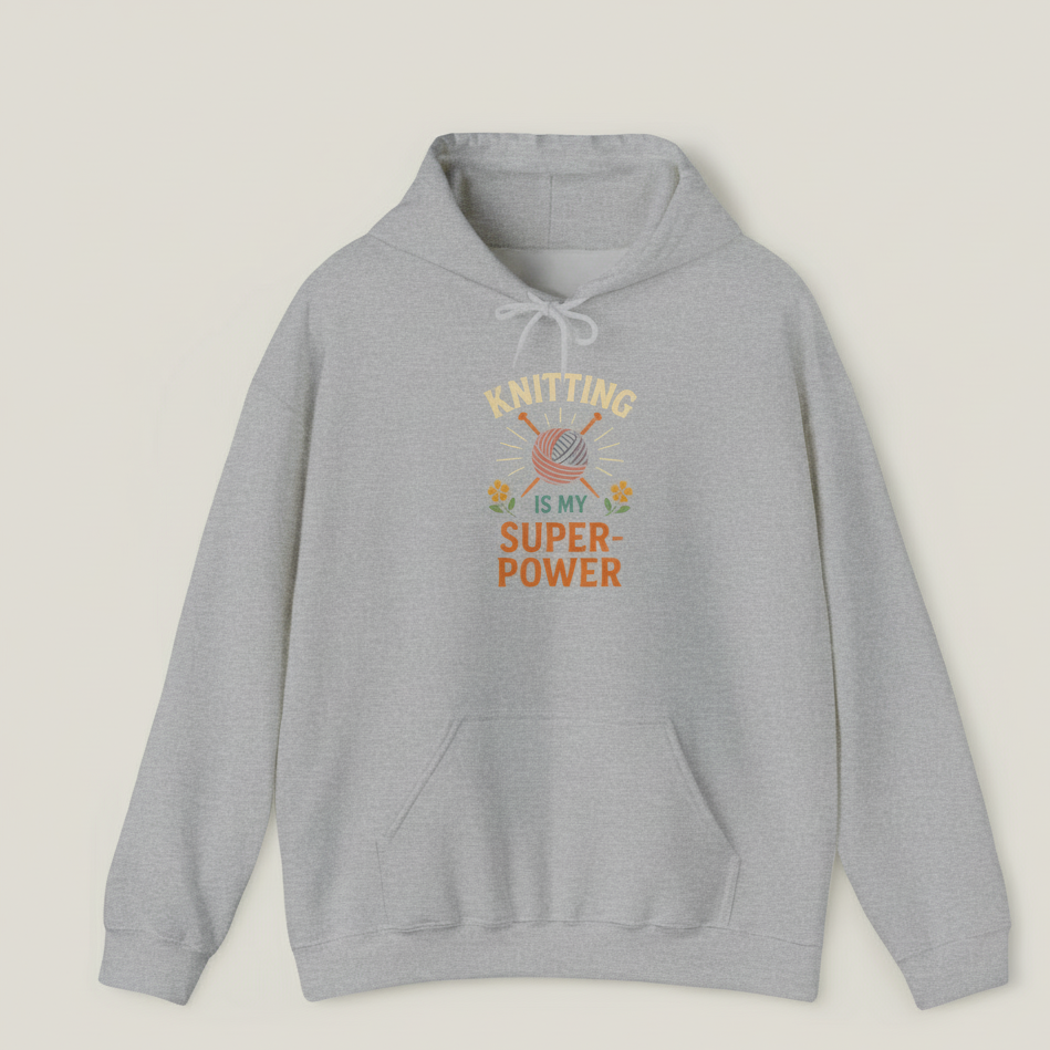 Gray hoodie with 'Knitting is my superpower' text on a light gray background
